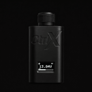 Black CtrlX wireless bass knob controller standing upright against a black background showing a 13.84V digital display screen